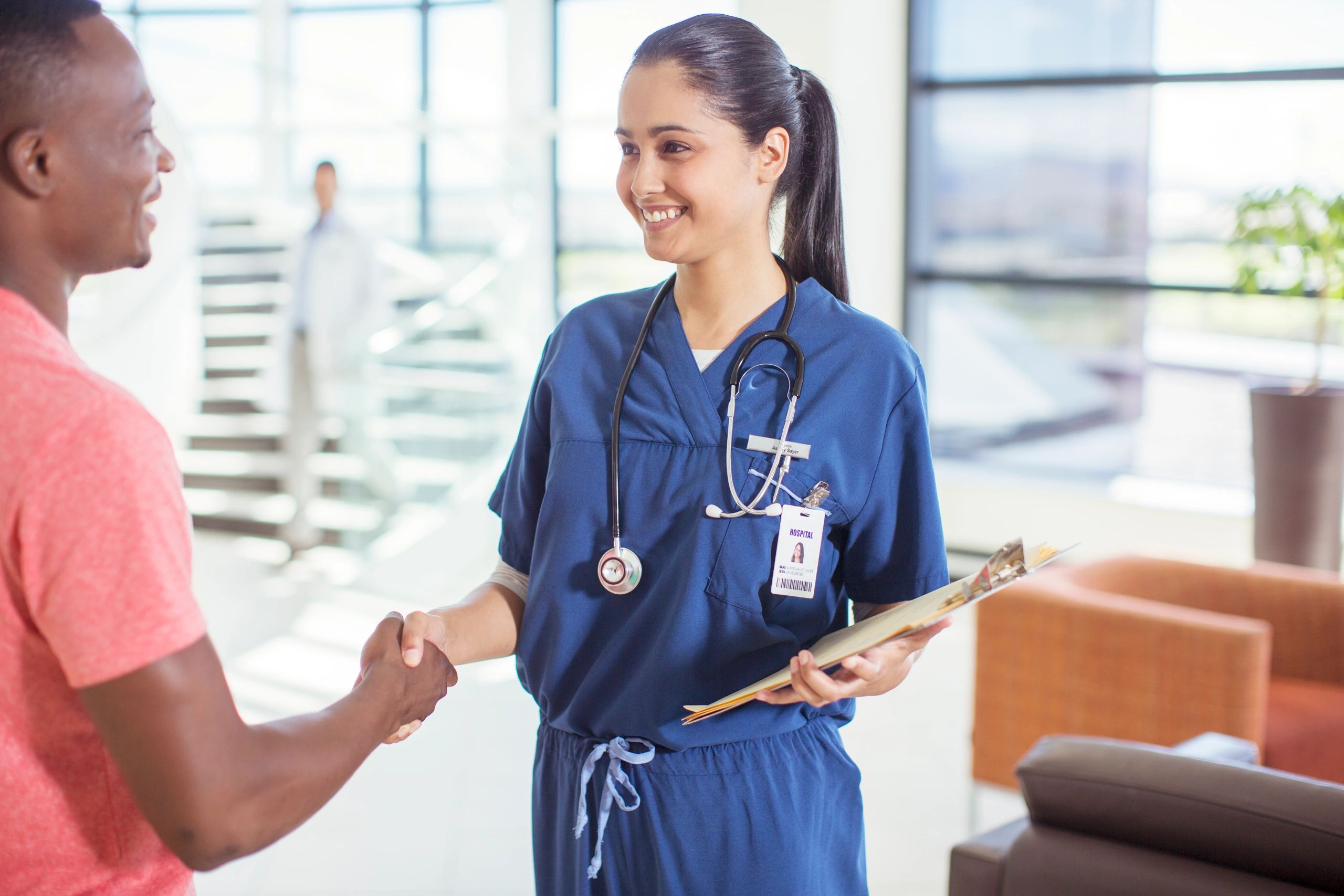 Clinic staff consulting with a triage nurse